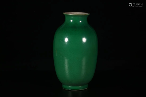 A MONOCHROME GREEN GLAZED PORCELAIN LANTERN VASE