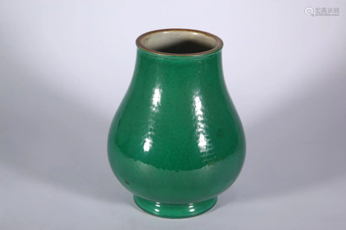 A MONOCHROME GREEN GLAZED PORCELAIN ZUN VASE