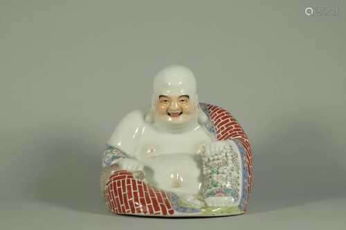 A FAMILLE ROSE MAITREYA BUDDHA FIGURINE