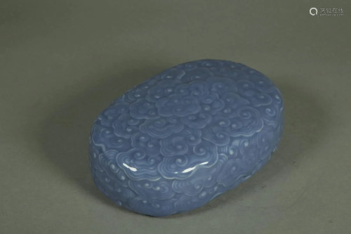 A BLUE GLAZED 'SEA WAVE' PORCELAIN PAPERWEIGHT