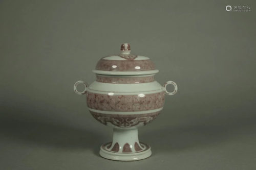 A COPPER RED GLAZED PORCELAIN CENSER WITH COVER