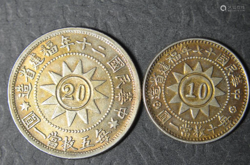 TWO CHINESE OLD SILVER COINS