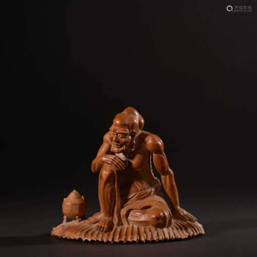 A BAMBOO CARVED SEATED ARHAT STATUE