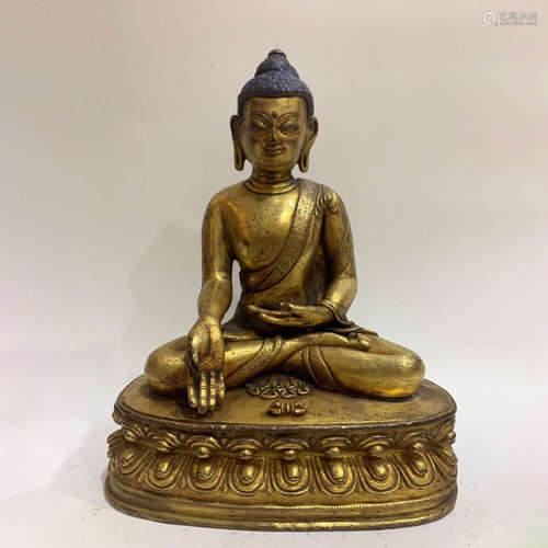 A GILD BRONZE BUDDHA STATUE