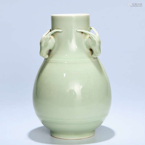 A PEA GREEN GLAZE PORCELAIN SHEEP-HEAD ZUN