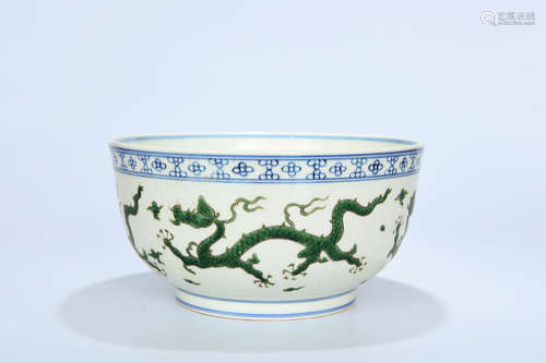 A BLUE WHITE GREEN DRAGON CARVED PORCELAIN BOWL