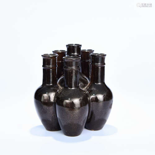 A BLACK GLAZED PORCELAIN VASE