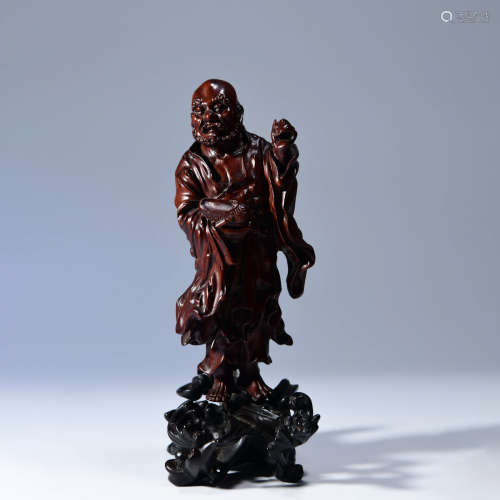 A BOXWOOD CARVED BODHIDHARMA ORNAMENT