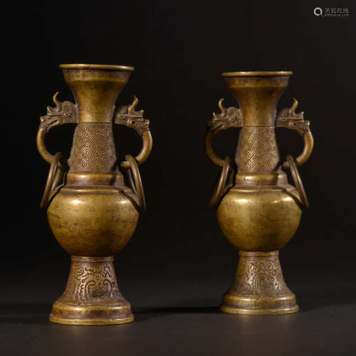 A PAIR OF FLORAL CARVED BRONZE DOUBLE DRAGON EARS VASE