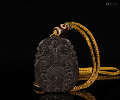 Carved Organic Material Pendant