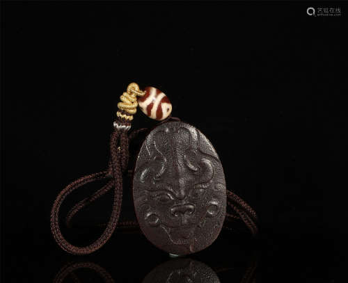 Carved Organic Material Pendant