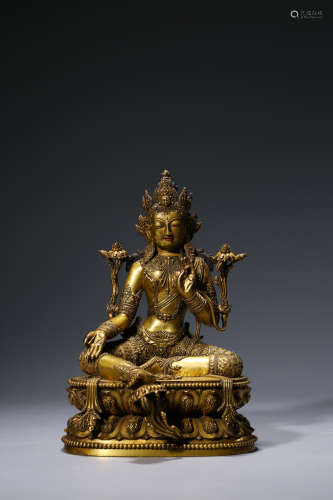A CHINESE GILT-BRONZE GREEN TARA STATUE WITH MING M…