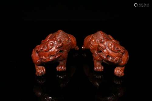 Pair Of Boxwood Beast Ornaments