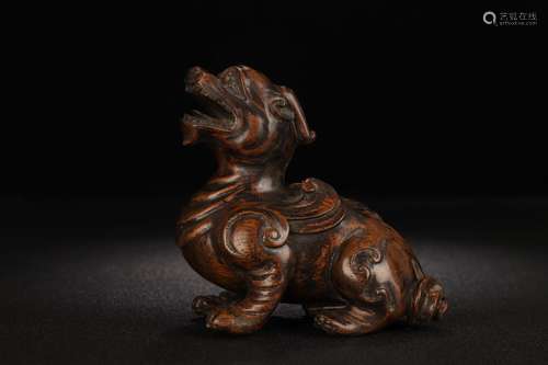 An Agarwood Beast Carved Ornament