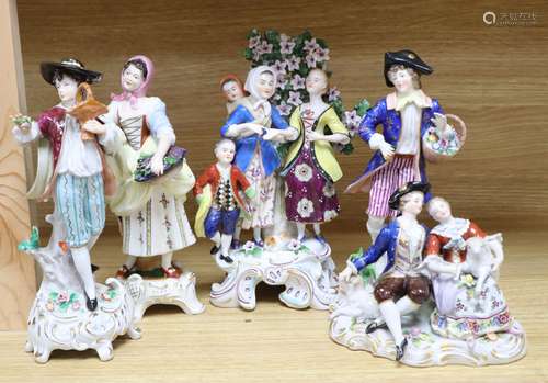 A Hochst style porcelain shepherd and shepherdess group and four other modern Continental figures,