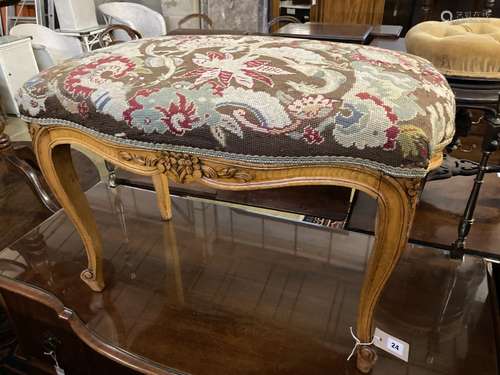 A Louis XVI style walnut dressing stool with tapestry seat, width 76cm, depth 46cm, height 50cm