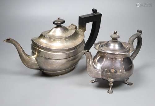 A George V silver London shape teapot and an earlier small circular form teapot with shaped rim,