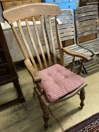 A Victorian elm and beech lathe back Windsor armchair, width 57cm, depth 50cm, height 160cm