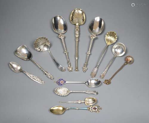 An ornate Edwardian silver gilt spoon, 22cm, ten other assorted silver spoons including