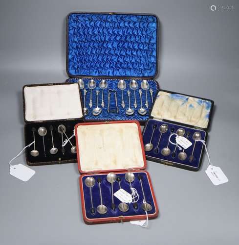 Twelve Victorian silver 'Apostle' coffee spoons and sugar tongs, Sheffield, 1883 and three sets of