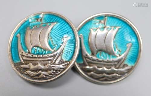 A pair of white metal (stamped silver) and enamel 'longboat' circular cufflinks, 27mm, gross 25.7