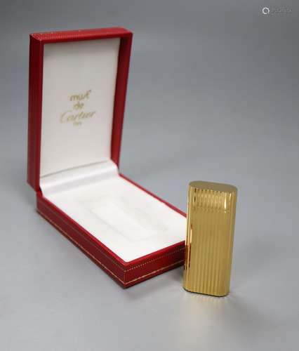 A cased Must de Cartier gold plated lighter