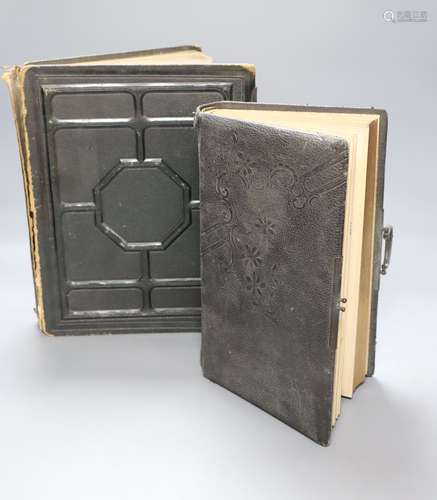 A Victorian album of cabinet portraits and one other sparsely mounted album (2)