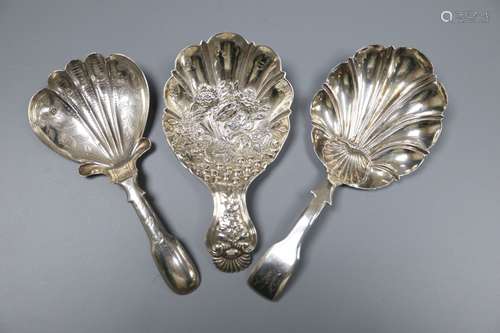 Three 19th century silver caddy spoons including embossed by Joseph Wilmore, Birmingham, 1825,