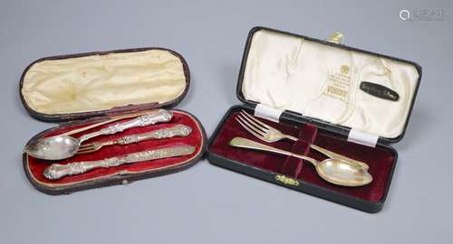 A cased Victorian silver christening trio (plated fork tines replacement), box a.f and a later cased