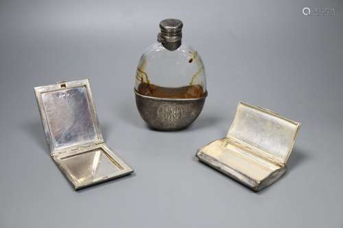 A Victorian silver-mounted glass oval hip flask, London, 1881,14cm, a later silver compact and a