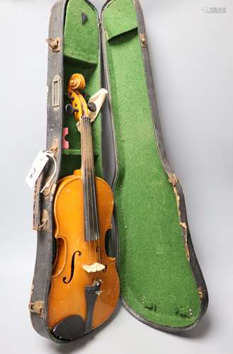 A 3/4 size violin, labelled 