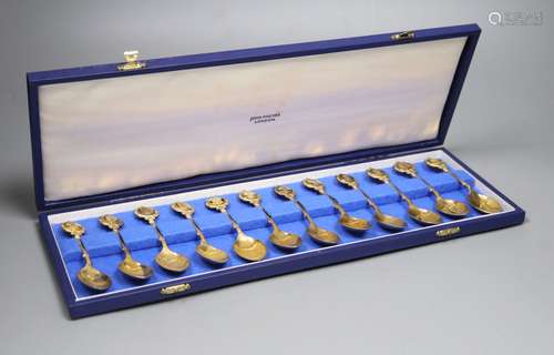 A set of 'The Twelve Roman' silver gilt spoons, sculpted by David Cornell, one of a limited