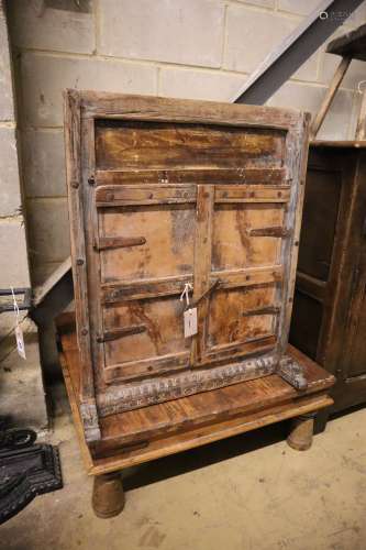 A low occasional table and an Eastern hardwood corner cupboard