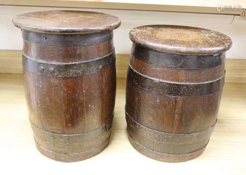 Two coopered oak sherry barrels (converted as small tables), height 39cm