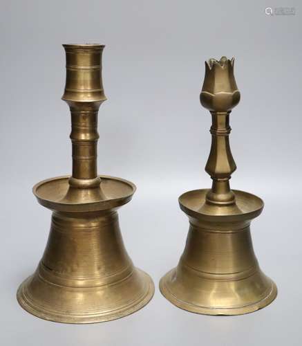 Two Ottoman brass candlesticks, height 28cmCONDITION: Larger candlestick two minor tears at footrim;