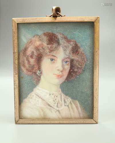 A Victorian miniature portrait on ivory of a ladyCONDITION: Please note that buyers outside of the