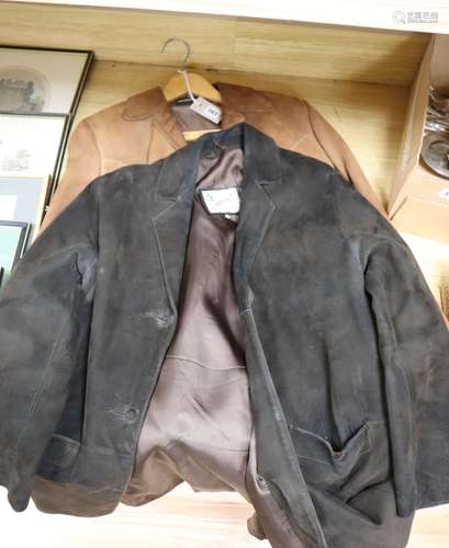 A light tan 1960's suede jacket and a similar chocolate brown jacket