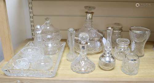 A collection of silver-mounted and other cut glass items, the silver-mounted items comprising an