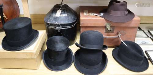 A solar pith helmet in japanned metal case, a military cap, a leather dressing case and seven