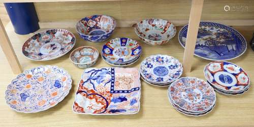 A collection of Japanese Imari dishes, bowls and a large square dishCONDITION: One large Imari