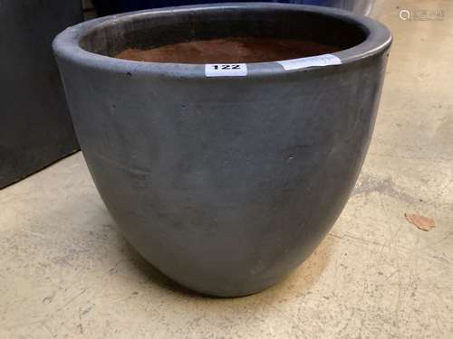 A circular grey glazed garden planter, diameter 36cm height 32cm