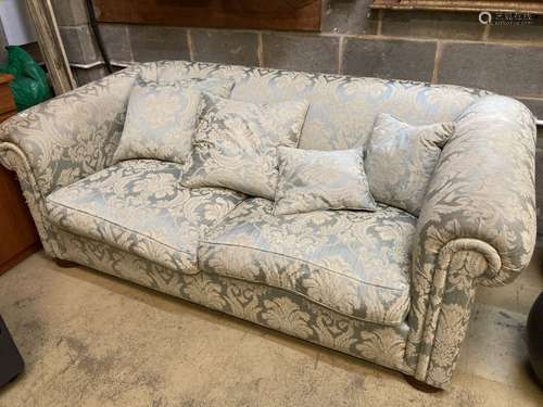 An early 20th century upholstered Chesterfield settee, length 200cm, depth 110cm, height 70cm