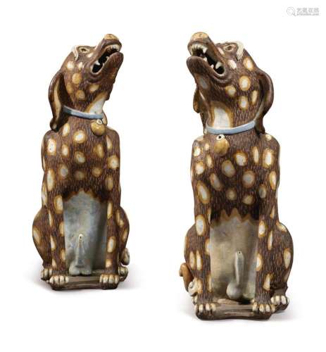 A Large and Unusual Pair of Chinese Export Stoneware Figures of Hounds, 19th / 20th Century | 十九 / 二十世紀 褐地白斑坐犬擺件一對