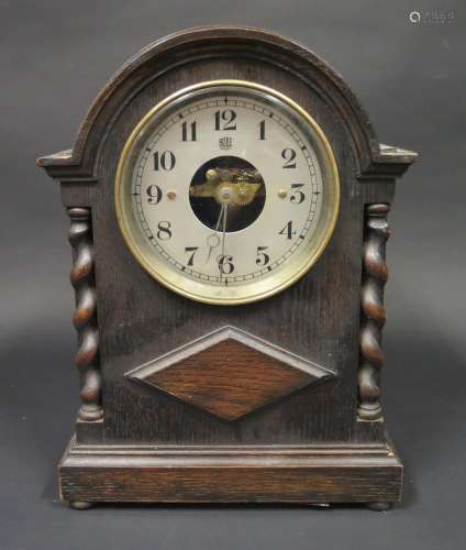 A BULLE Oak Cased Battery Operated Clock, 32cm high