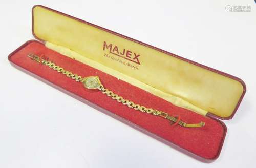 A Majex Ladies 9ct Gold Wristwatch, running and boxed, 9.5g and ladies Rotary and Lorus watches