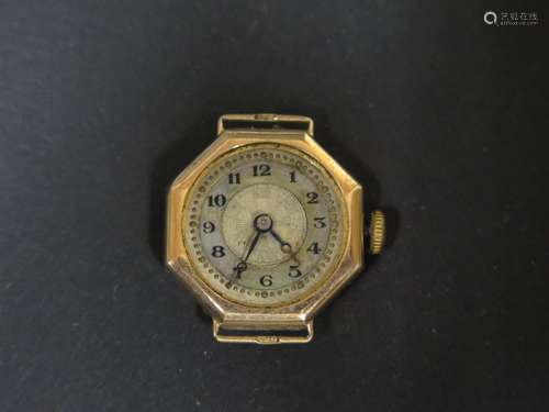 A Ladies 9ct Gold Watch with mother of pearl chapter ring, 2g. A/F