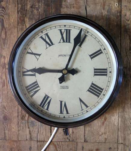 A MAGNETA Bakelite Cased Mains Powered Electric Wall Clock, 11