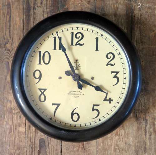 An International Time Recording Company Electric Wall Clock in Bakelite case with 11