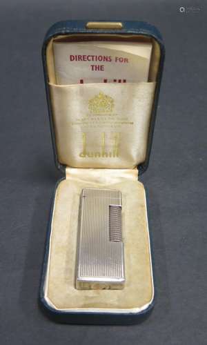 A Silver Dunhill Rollagas Lighter, boxed with papers and working