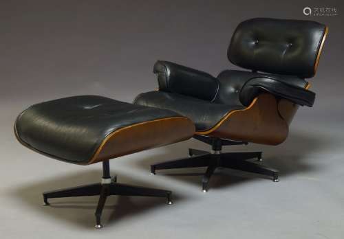 After Charles and Ray Eames, a '670' style lounge chair and '671' style ottoman, with tulipwood